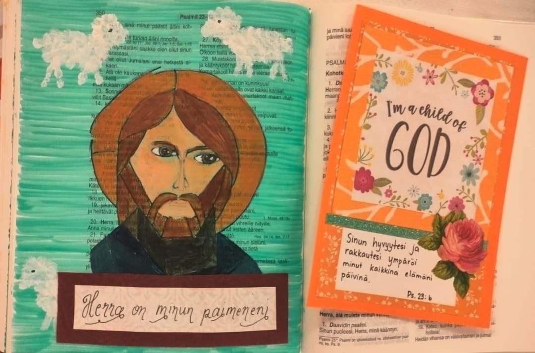 Piirros, jossa Jeesus ja lampaita.